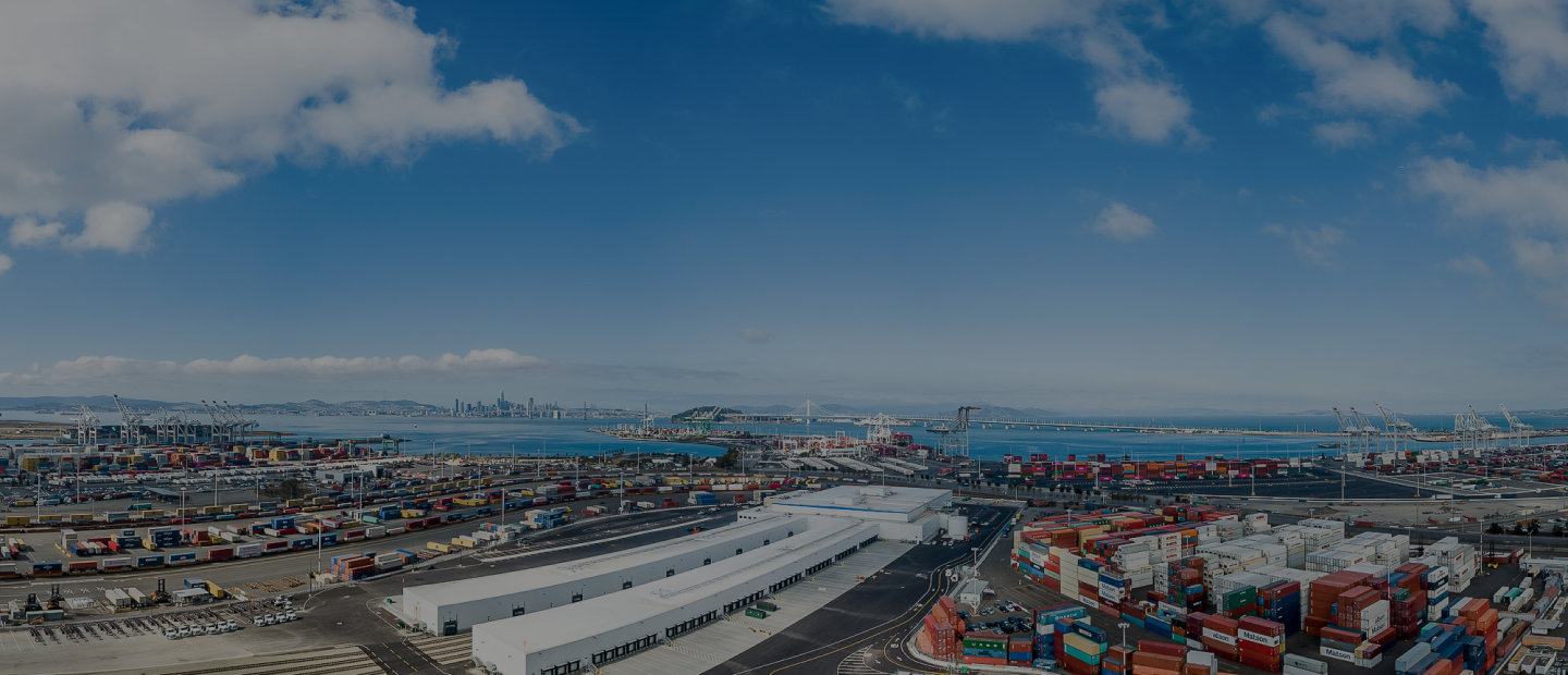 View of shipping port with Lineage cold storage facilities and fleet of temperature-controlled trucks.